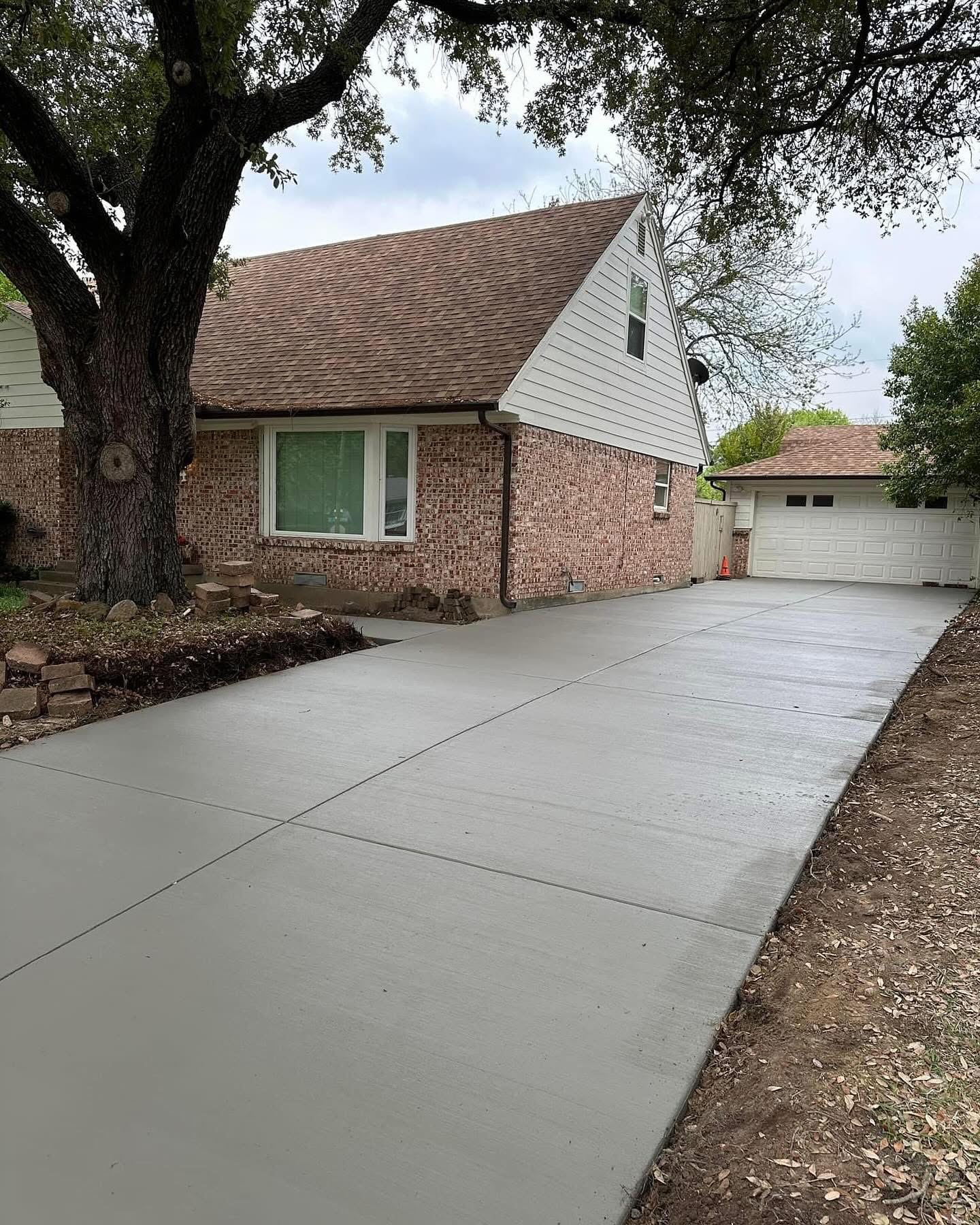 Installing a new concrete driveway for a residential home in Sachse, TX. Pro Quality Concrete, Concrete Company, Residential Driveway